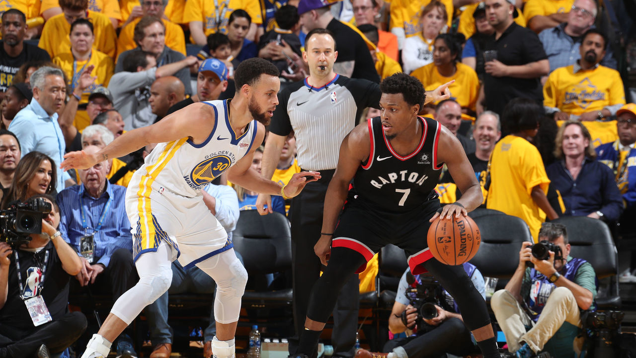 OAKLAND, CA - JUNE 5: Kyle Lowry #7 of the Toronto Raptors handles the ball against Stephen Curry #30 of the Golden State Warriors during Game Three of the NBA Finals on June 5, 2019 at ORACLE Arena in Oakland, California. NOTE TO USER: User expressly acknowledges and agrees that, by downloading and/or using this photograph, user is consenting to the terms and conditions of Getty Images License Agreement. Mandatory Copyright Notice: Copyright 2019 NBAE