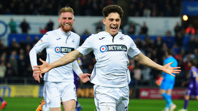 SWANSEA, WALES - APRIL 09: Daniel James of Swansea City celebrates scoring the opening goal during the Sky Bet Championship match between Swansea City and Stoke City at the Liberty Stadium on April 09, 2019 in Swansea, Wales.
