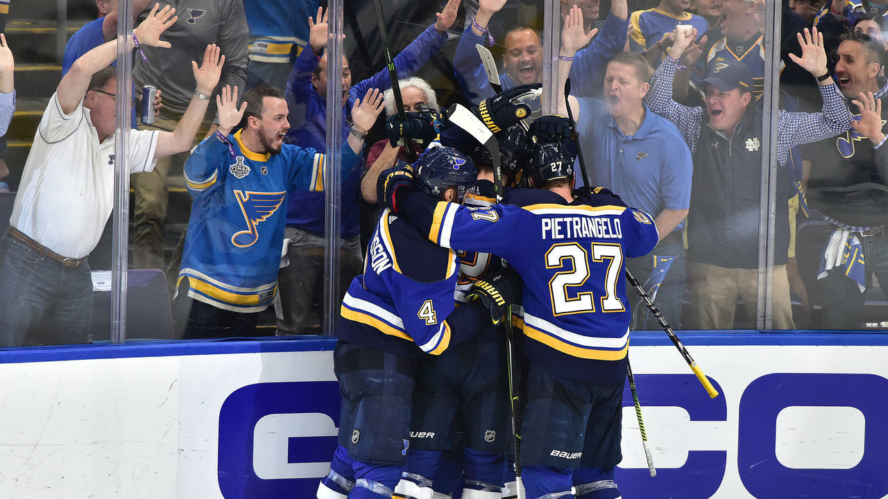 ST. LOUIS, MO - JUN 03: Blues players celebrate after a tie-breaking goal by St. Louis Blues center Ryan O'Reilly (90) during Game 4 of the Stanley Cup Final between the Boston Bruins and the St. Louis Blues, on June 01, 2019, at Enterprise Center, St. Louis, Mo.