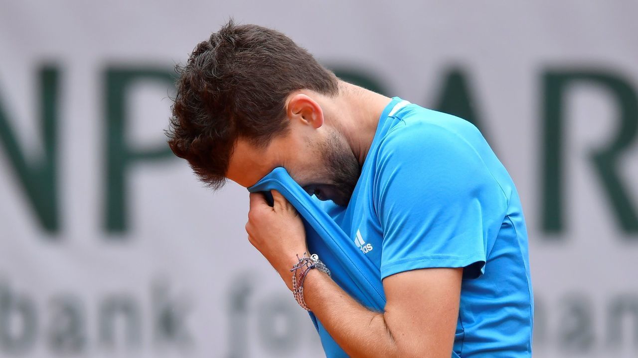 PARIS, FRANCE - JUNE 07: Dominic Thiem of Austria in action against Novak Djokovic (not seen) of Serbia during their semi final match at the French Open tennis tournament at Roland Garros Stadium in Paris, France on June 07, 2019.