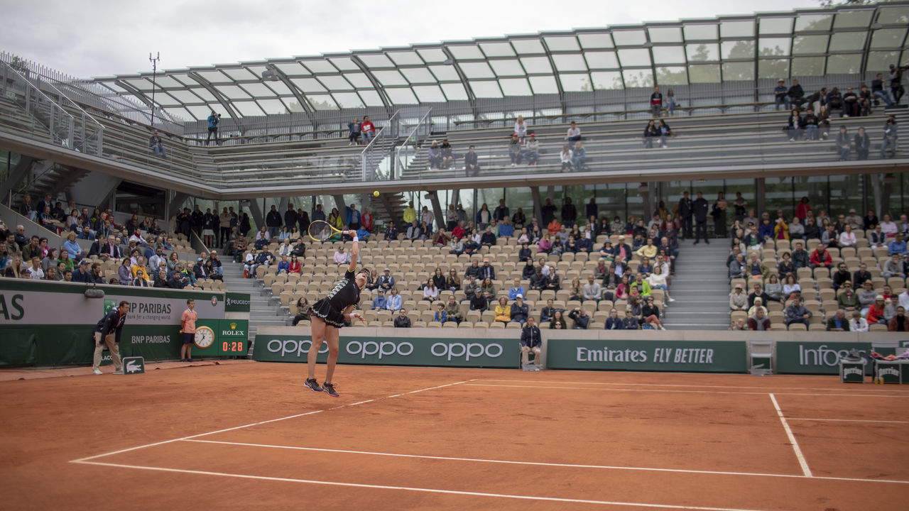 PARIS, FRANCE June 07. Johanna Konta of Great Britain in action against Marketa Vondrousova of the Czech Republic on Court Simonne-Mathieu during the Women's Singles Semifinals match at the 2019 French Open Tennis Tournament at Roland Garros on June 7th 2019 in Paris, France.