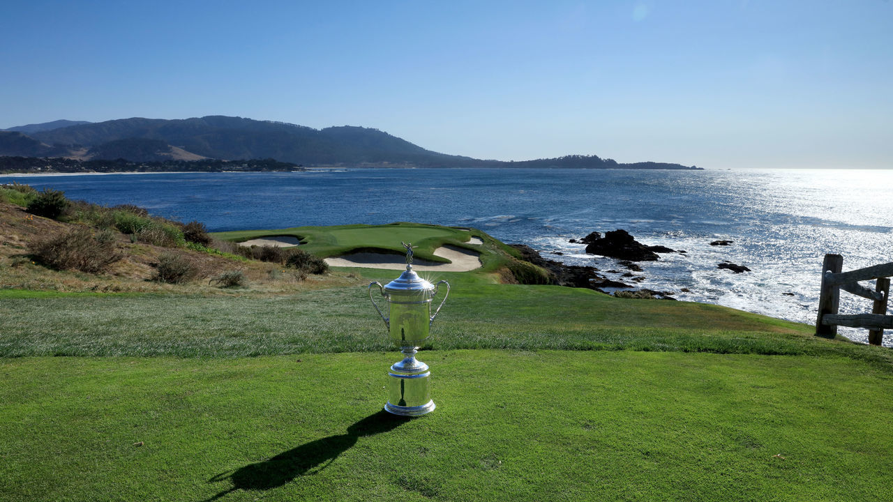 PEBBLE BEACH, CA - NOVEMBER 08: The United States Open Championship trophy placed on the par 3, seventh tee during the USGA 2019 US Open Championship media preview day at Pebble Beach Golf Links on November 8, 2018 in Pebble Beach, California.
