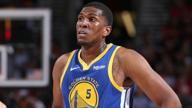PORTLAND, OR - MAY 20: Kevon Looney #5 of the Golden State Warriors looks on during Game Four of the Western Conference Finals against the Portland Trail Blazers on May 20, 2019 at the Moda Center in Portland, Oregon. NOTE TO USER: User expressly acknowledges and agrees that, by downloading and/or using this photograph, user is consenting to the terms and conditions of the Getty Images License Agreement. Mandatory Copyright Notice: Copyright 2019 NBAE