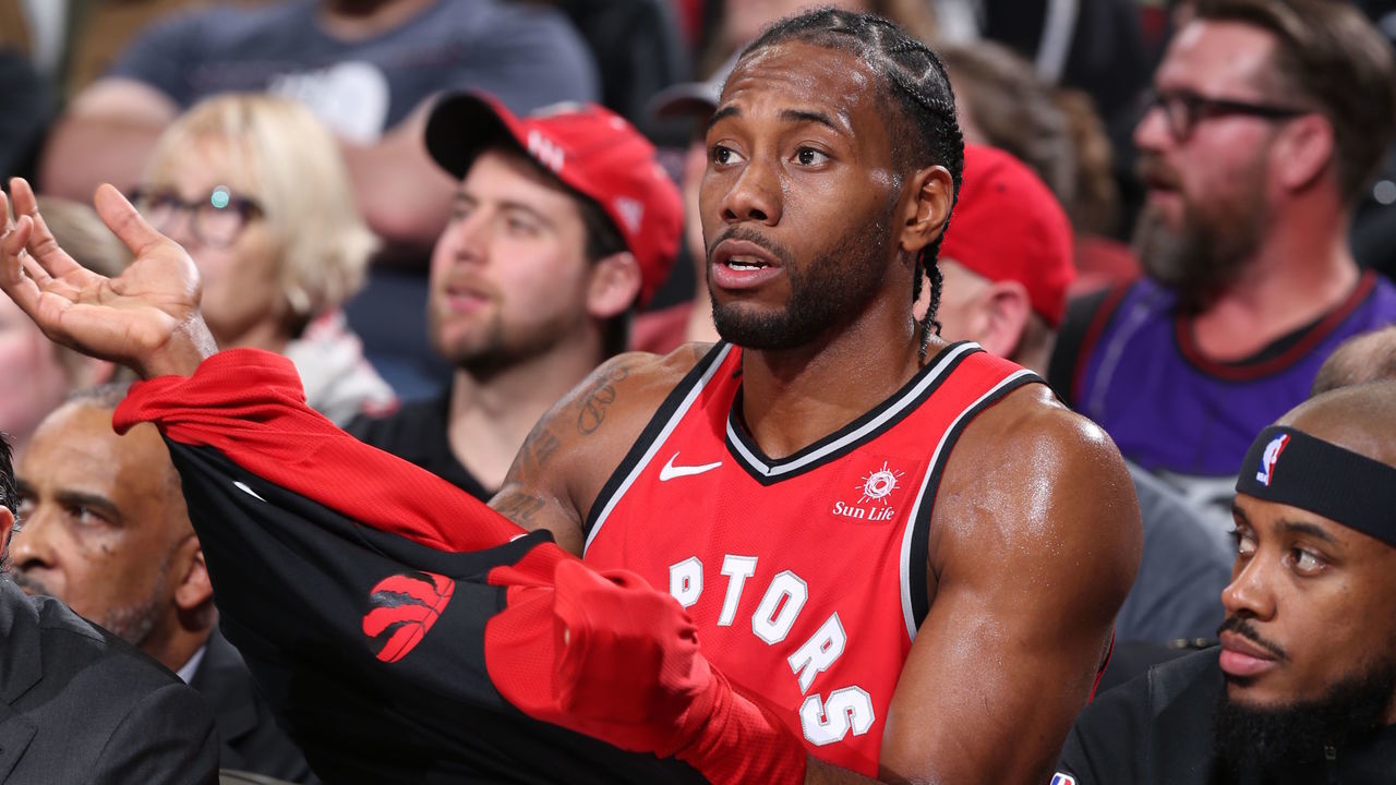 PORTLAND, OR - DECEMBER 14: Kawhi Leonard #2 of the Toronto Raptors seen on the bench during the game against the Portland Trail Blazers on December 14, 2018 at the Moda Center Arena in Portland, Oregon. Mandatory Copyright Notice: Copyright 2018 NBAE