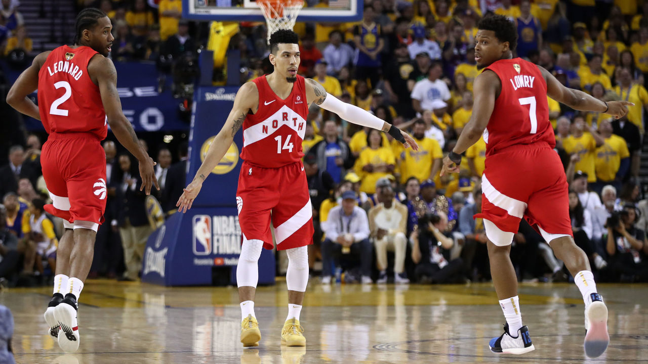 OAKLAND, CALIFORNIA - JUNE 07: Danny Green #14 of the Toronto Raptors celebrates the basket with Kawhi Leonard #2 and Kyle Lowry #7 against the Golden State Warriors in the second half during Game Four of the 2019 NBA Finals at ORACLE Arena on June 07, 2019 in Oakland, California.