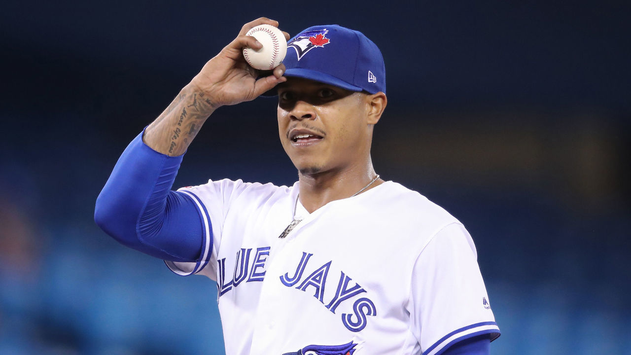 TORONTO, ON - MAY 21: Marcus Stroman #6 of the Toronto Blue Jays looks to the Red Sox dugout in response to heckling from Michael Chavis #23 of the Boston Red Sox in the fourth inning during MLB game action at Rogers Centre on May 21, 2019 in Toronto, Canada.