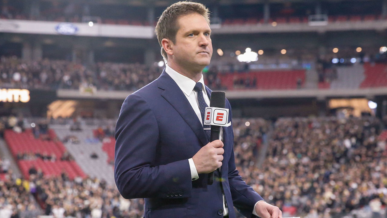 GLENDALE, AZ - JANUARY 01: ESPN sideline reporter Todd McShay reports before the college football game between the UCF Knights and the LSU Tigers on January 1, 2019 at State Farm Stadium in Glendale, Arizona.