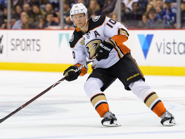VANCOUVER, BC - MARCH 26: Anaheim Ducks Left Wing Corey Perry (10) passes the puck during their NHL game against the Vancouver Canucks at Rogers Arena on March 26, 2019 in Vancouver, British Columbia, Canada. Anaheim won 5-4.