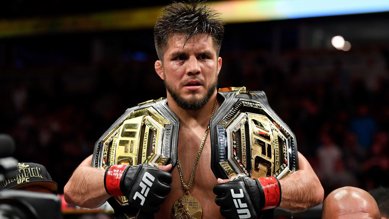 CHICAGO, IL - JUNE 08: Henry Cejudo celebrates his TKO victory over Marlon Moraes of Brazil in their bantamweight championship bout during the UFC 238 event at the United Center on June 8, 2019 in Chicago, Illinois.
