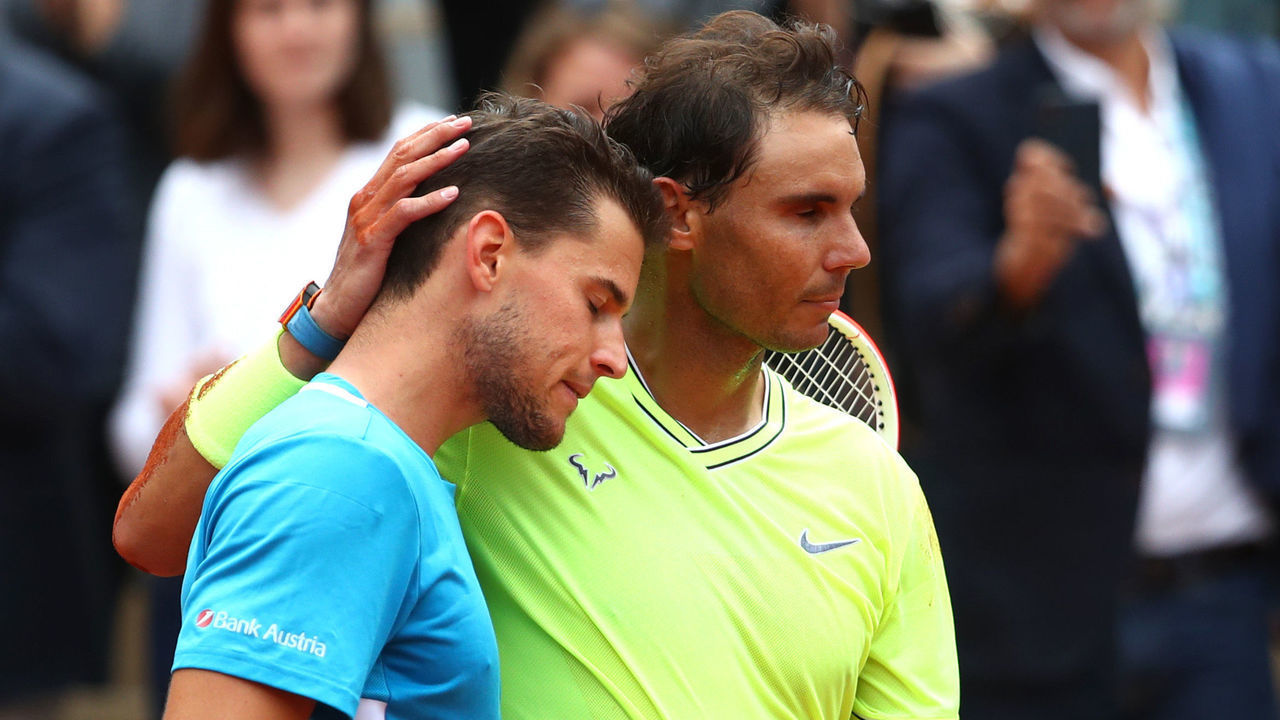 PARIS, FRANCE - JUNE 09: Rafael Nadal of Spain embraces Dominic Thiem of Austria following victory in the mens singles final during Day fifteen of the 2019 French Open at Roland Garros on June 09, 2019 in Paris, France.
