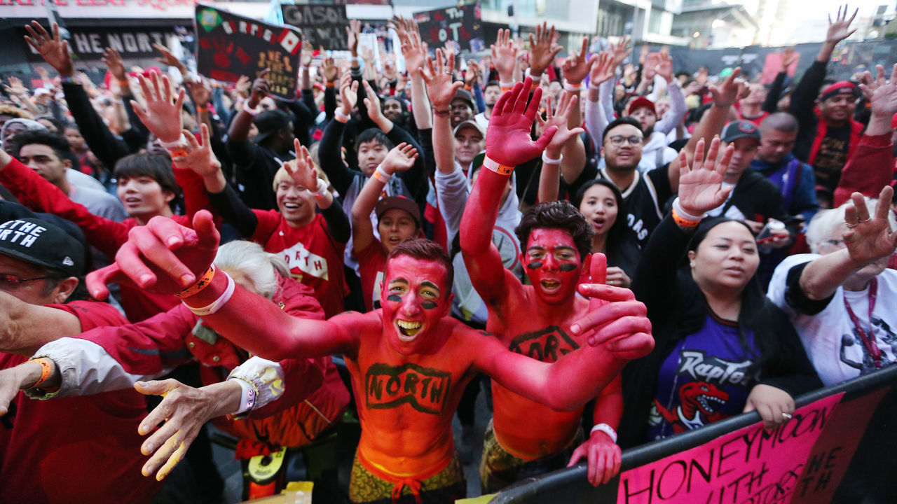 TORONTO, ON- JUNE 2 - Fans in Jurassic Park cheer as the Toronto Raptors play the Golden State Warriors in game Two of the NBA Finals at Scotiabank Arena in Toronto. June 2, 2019. (Steve Russell/Toronto Star via Getty Images)