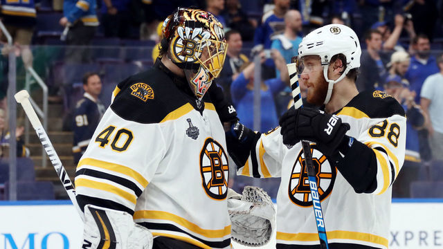 ST LOUIS, MISSOURI - JUNE 09: Tuukka Rask #40 and David Pastrnak #88 of the Boston Bruins celebrate their teams 5-1 win over the St. Louis Blues in Game Six of the 2019 NHL Stanley Cup Final at Enterprise Center on June 09, 2019 in St Louis, Missouri.