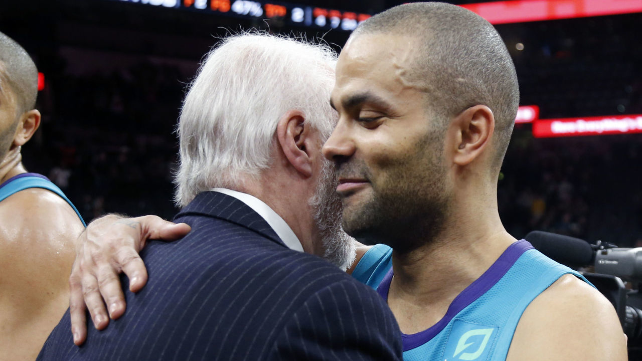 SAN ANTONIO, TX - JANUARY 14: Former San Antonio Spurs player Tony Parker #9 of the Charlotte Hornets greets his former head coach, Gregg Popvich of the San Antonio Spurs at the end of the game at AT&T Center on January 14, 2019 in San Antonio, Texas. NOTE TO USER: User expressly acknowledges and agrees that , by downloading and or using this photograph, User is consenting to the terms and conditions of the Getty Images License Agreement.