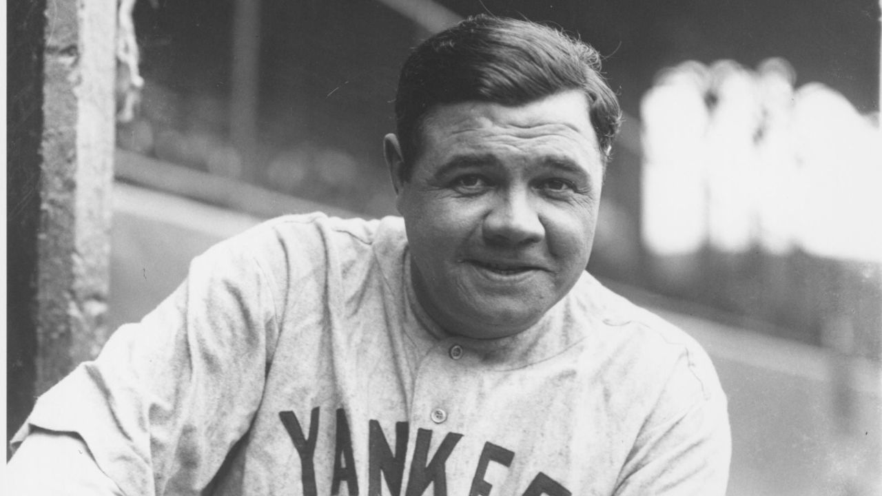 CLEVELAND, OH - MAY 19, 1927: Babe Ruth portrait, visitors dugout League Park. The game between the Indians and Yankees was eventually rained out and rescheduled for a later date. .