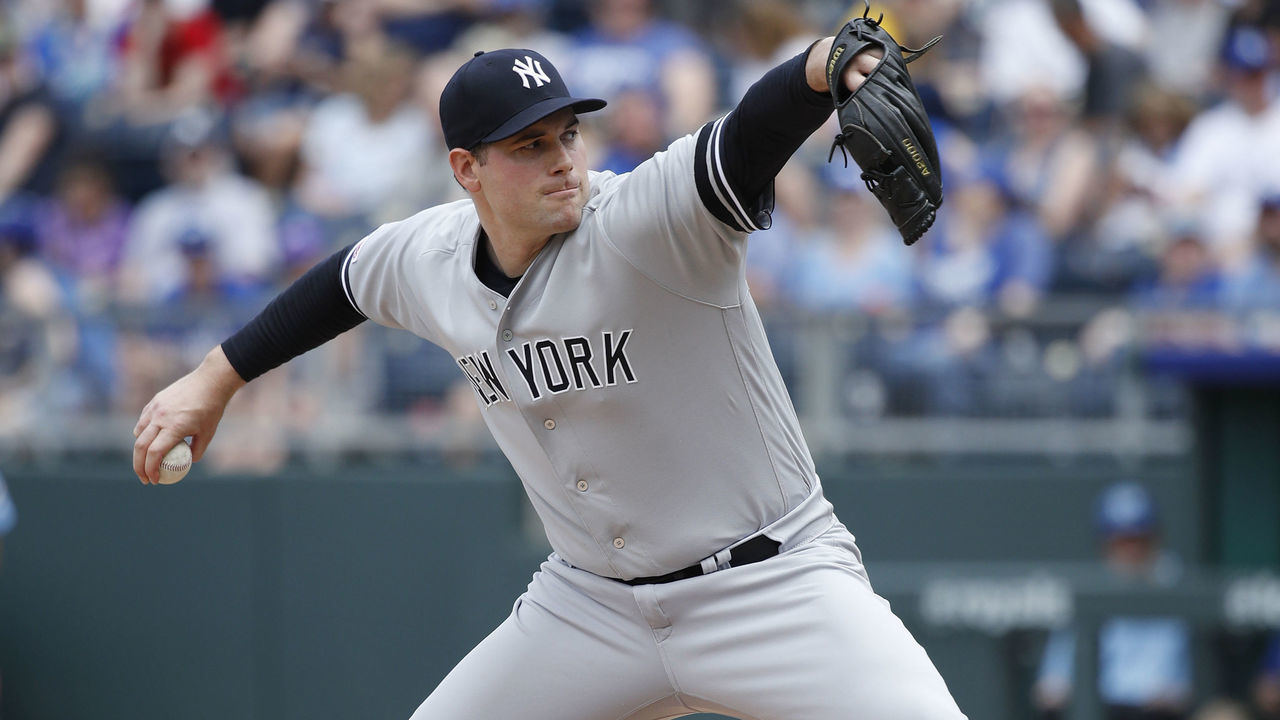KANSAS CITY, MO - MAY 25: Adam Ottavino #0 of the New York Yankees pitches during game one of a doubleheader against the Kansas City Royals at Kauffman Stadium on May 25, 2019 in Kansas City, Missouri. The Yankees won 7-3.
