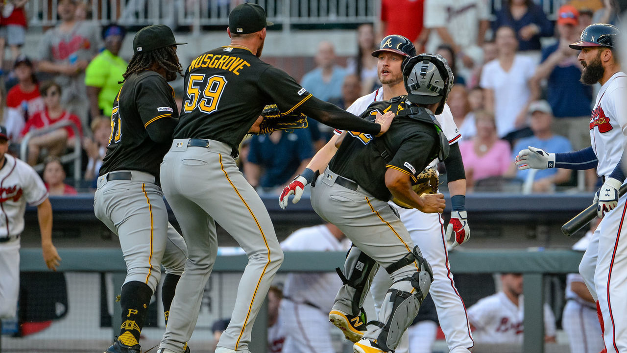 ATLANTA, GA - JUNE 10: Atlanta Braves third baseman Josh Donaldson (20) has words with Pittsburgh Pirates starting pitcher Joe Musgrove (59) after being hits a by a pitch during the MLB baseball game between the Pittsburgh Pirates and the Atlanta Braves on June 10, 2019 at SunTrust Park in Atlanta, GA.
