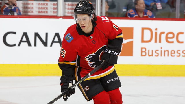 CALGARY, AB - MARCH 31: Spencer Foo #16 of the Calgary Flames plays against the Edmonton Oilers during an NHL game on March 31, 2018 at the Scotiabank Saddledome in Calgary, Alberta, Canada.