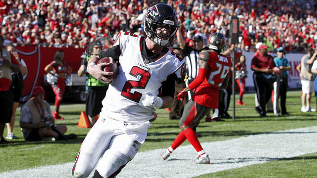 TAMPA, FL - DECEMBER 30: Matt Ryan #2 of the Atlanta Falcons runs into the end zone with a touchdown reception from Mohamed Sanu on a trick play during the game against the Tampa Bay Buccaneers at Raymond James Stadium on December 30, 2018 in Tampa, Florida. The Falcons won 34-32.