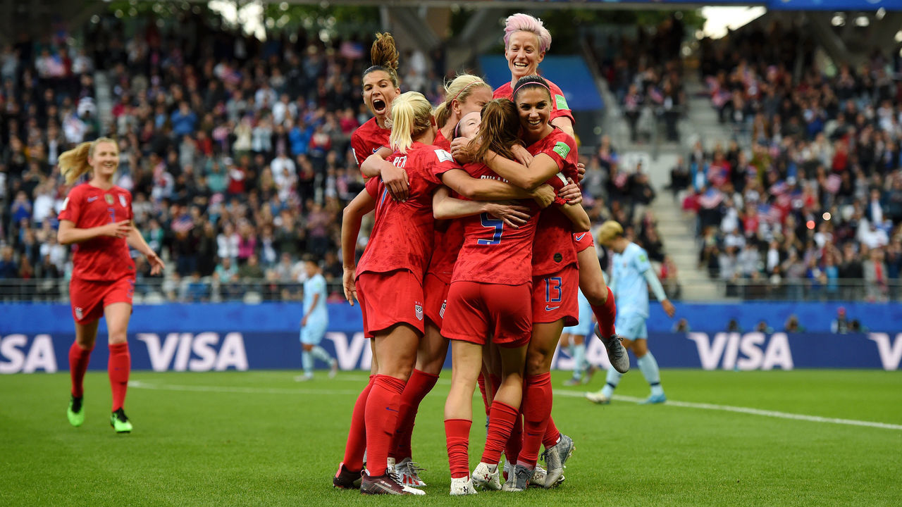 REIMS, FRANCE - JUNE 11: Alex Morgan of the USA celebrates with teammates after scoring her team's first goal during the 2019 FIFA Women's World Cup France group F match between USA and Thailand at Stade Auguste Delaune on June 11, 2019 in Reims, France.