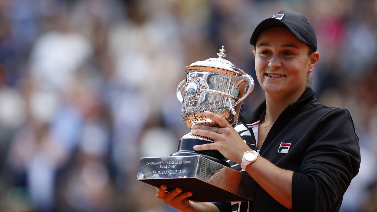 Australia's Ashleigh Barty poses with the trophy Suzanne Lenglen after winning against Czech Republic's Marketa Vondrousova at the end of the women's singles final match on day fourteen of The Roland Garros 2019 French Open tennis tournament in Paris on June 8, 2019.