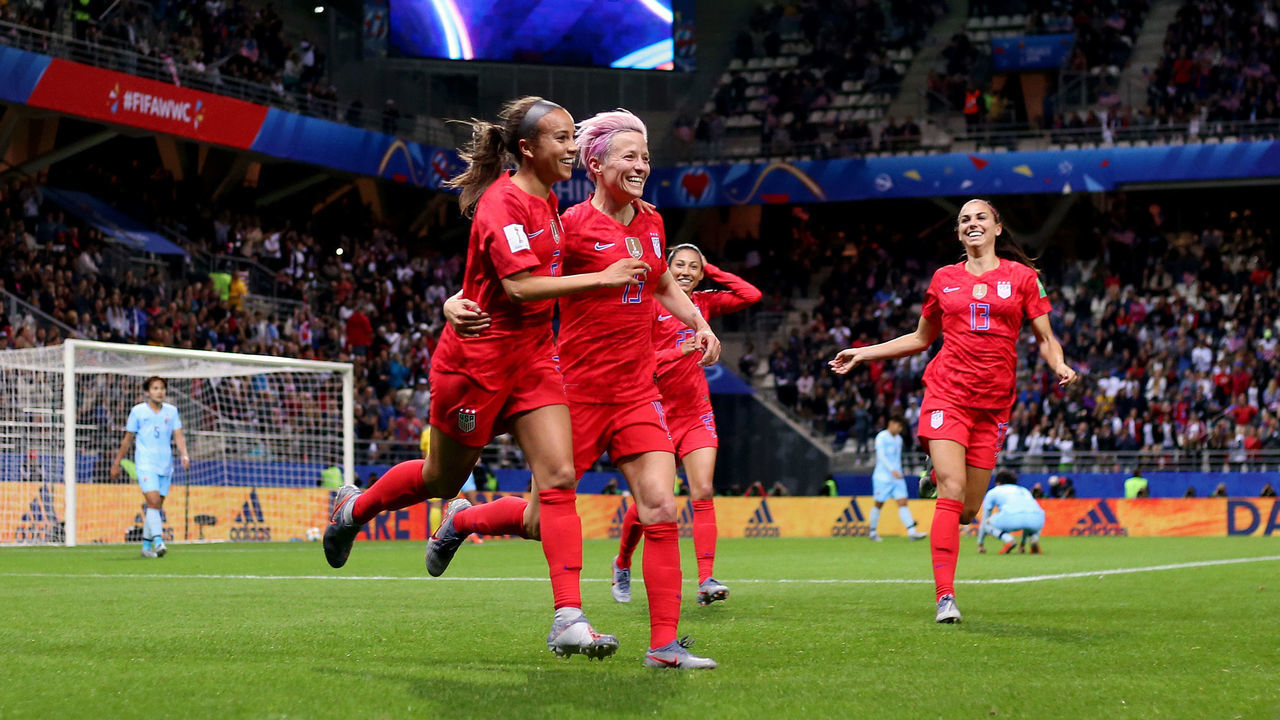 REIMS, FRANCE - JUNE 11: Mallory Pugh of the USA celebrates with teammate Megan Rapinoe after scoring her team's eleventh goal during the 2019 FIFA Women's World Cup France group F match between USA and Thailand at Stade Auguste Delaune on June 11, 2019 in Reims, France.