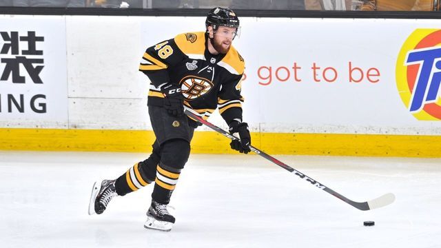 BOSTON, MA - MAY 29: Boston Bruins defenseman Matt Grzelcyk (48) looks fro an open teammate up ice to receive the pass. During Game 2 of the Stanley Cup Finals featuring the Boston Bruins against the St. Louis Blues on May 29, 2019 at TD Garden in Boston, MA.