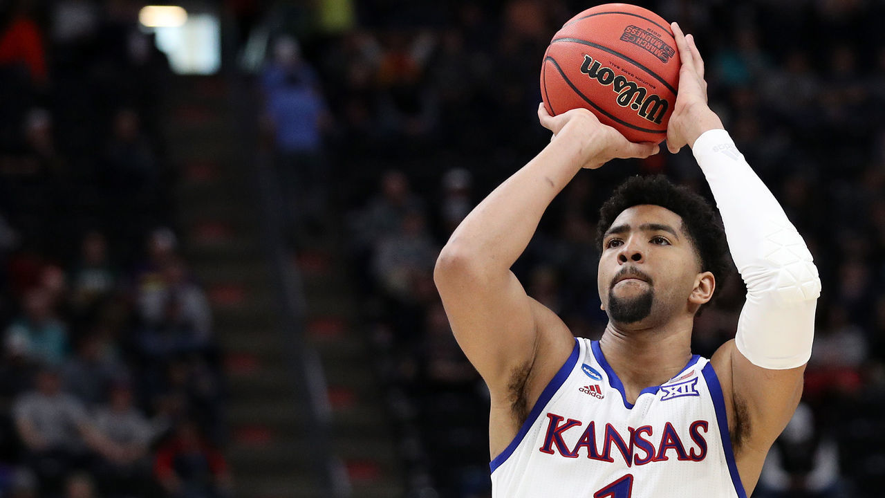 SALT LAKE CITY, UTAH - MARCH 21: Dedric Lawson #1 of the Kansas Jayhawks shoots a free throw during the second half against the Northeastern Huskies in the first round of the 2019 NCAA Men's Basketball Tournament at Vivint Smart Home Arena on March 21, 2019 in Salt Lake City, Utah.