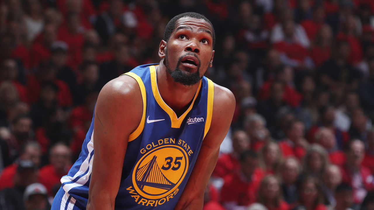 TORONTO, CANADA - JUNE 10: Kevin Durant #35 of the Golden State Warriors looks on against the Toronto Raptors during Game Five of the NBA Finals on June 10, 2019 at Scotiabank Arena in Toronto, Ontario, Canada. NOTE TO USER: User expressly acknowledges and agrees that, by downloading and/or using this photograph, user is consenting to the terms and conditions of the Getty Images License Agreement. Mandatory Copyright Notice: Copyright 2019 NBAE