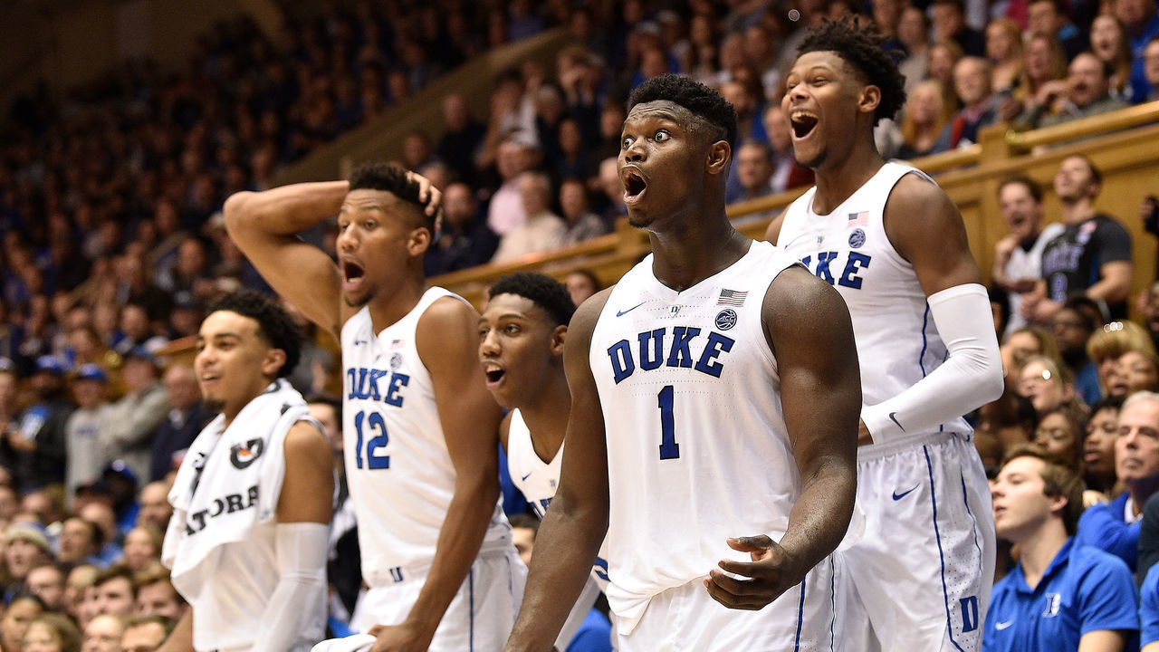 DURHAM, NORTH CAROLINA - DECEMBER 18: Starters (L-R) Tre Jones #3, Javin DeLaurier #12, RJ Barrett #5, Zion Williamson #1 and Cam Reddish #2 cheer on the reserves during their game against the Princeton Tigers at Cameron Indoor Stadium on December 18, 2018 in Durham, North Carolina. Duke won 101-50.