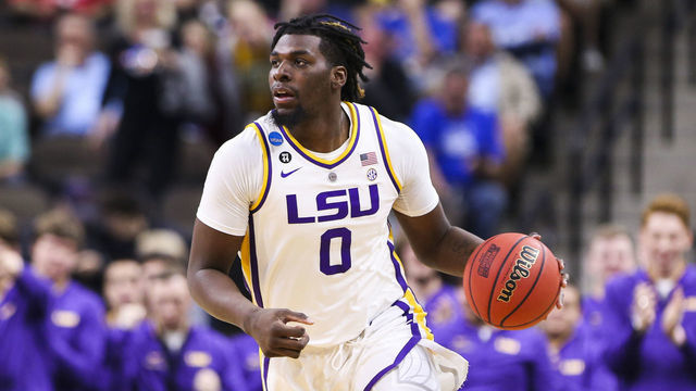 JACKSONVILLE, FL - MARCH 21: LSU Tigers forward Naz Reid (0) dribbles the ball against Yale Bulldogs in the first round of the 2019 NCAA Men's Basketball Tournament held at VyStar Veterans Memorial Arena on March 21, 2019 in Jacksonville, Florida.