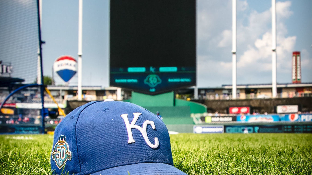 KANSAS CITY, MO - AUGUST 11: Kansas City Royals hat sits on the field the MLB interleague game against the St. Louis Cardinals on August 11, 2018 at Kauffman Stadium in Kansas City, Missouri.