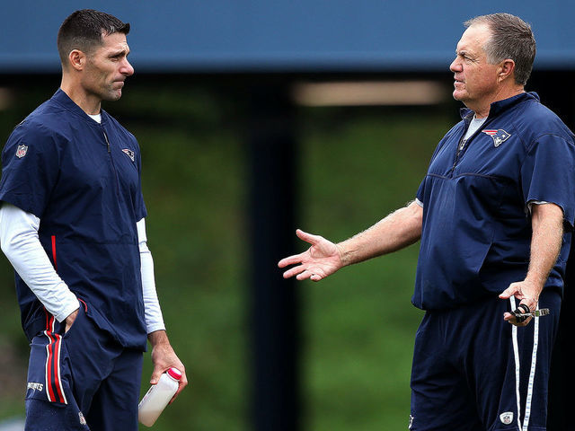 FOXBOROUGH, MA - SEPTEMBER 13: New England Patriots Director of Player Personnel Nick Caserio, left, stands with head coach Bill Belichick during New England Patriots practice at the Gillette Stadium practice facility in Foxborough, MA on Sep. 13, 2018.