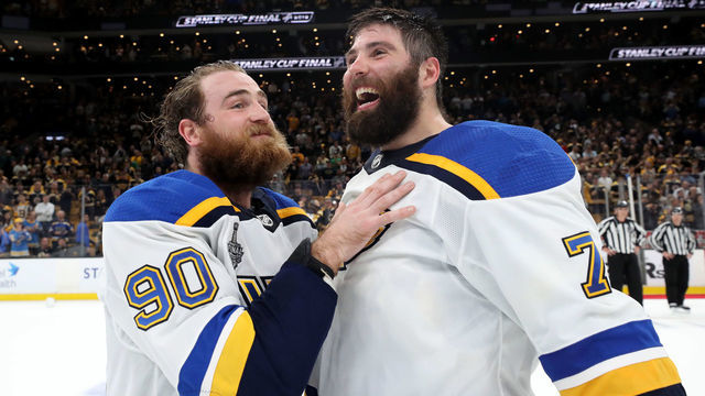 BOSTON, MASSACHUSETTS - JUNE 12: Ryan O'Reilly #90 and Pat Maroon #7 of the St. Louis Blues celebrate after defeating the Boston Bruins to win Game Seven of the 2019 NHL Stanley Cup Final at TD Garden on June 12, 2019 in Boston, Massachusetts.