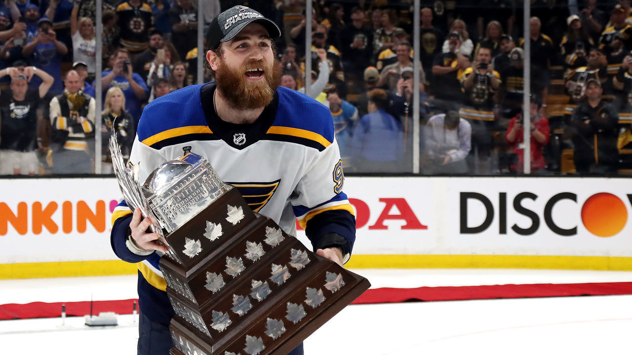 BOSTON, MASSACHUSETTS - JUNE 12: Ryan O'Reilly #90 of the St. Louis Blues celebrates with the Conn Smythe Trophy after defeating the Boston Bruins 4-1 to win Game Seven of the 2019 NHL Stanley Cup Final at TD Garden on June 12, 2019 in Boston, Massachusetts.