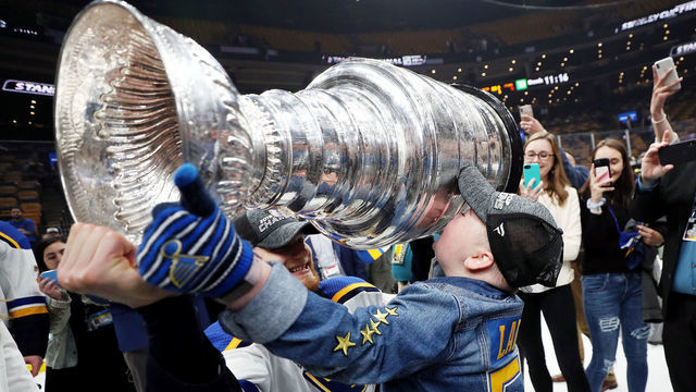 BOSTON, MASSACHUSETTS - JUNE 12: Colton Parayko #55 of the St. Louis Blues and Laila Anderson celebrate with the Stanley Cup after defeating the Boston Bruins in Game Seven to win the 2019 NHL Stanley Cup Final at TD Garden on June 12, 2019 in Boston, Massachusetts.