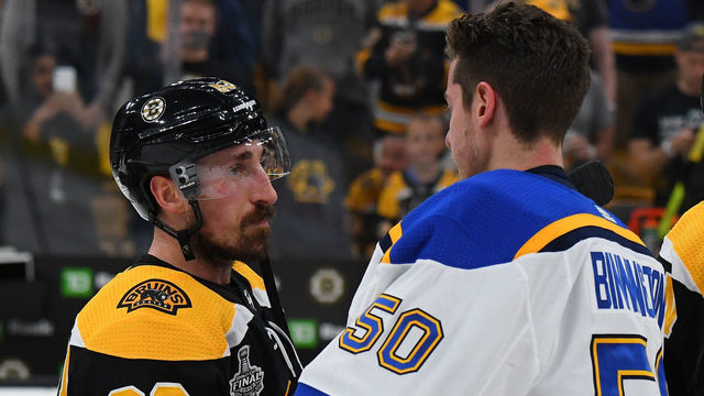 BOSTON, MA - JUNE 12: Brad Marchand #63 of the Boston Bruins shakes hands with Jordan Binnington #50 of the St Louis Blues after losing in Game Seven of the Stanley Cup Final at the TD Garden on June 12, 2019 in Boston, Massachusetts.
