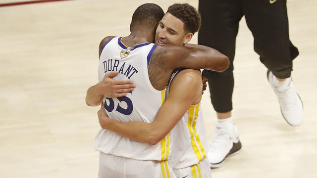 CLEVELAND, OH - JUNE 8: Kevin Durant #35 and Klay Thompson #11 of the Golden State Warriors hug after Game Four of the 2018 NBA Finals against the Cleveland Cavaliers on June 8, 2018 at Quicken Loans Arena in Cleveland, Ohio. NOTE TO USER: User expressly acknowledges and agrees that, by downloading and/or using this photograph, user is consenting to the terms and conditions of the Getty Images License Agreement. Mandatory Copyright Notice: Copyright 2018 NBAE