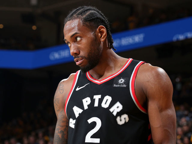 OAKLAND, CA - JUNE 5: Kawhi Leonard #2 of the Toronto Raptors looks on during Game Three of the NBA Finals against the Golden State Warriors on June 5, 2019 at ORACLE Arena in Oakland, California. NOTE TO USER: User expressly acknowledges and agrees that, by downloading and/or using this photograph, user is consenting to the terms and conditions of Getty Images License Agreement. Mandatory Copyright Notice: Copyright 2019 NBAE