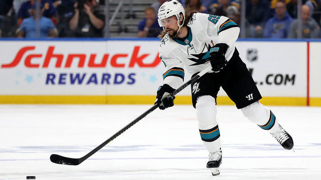 ST LOUIS, MISSOURI - MAY 15: Erik Karlsson #65 of the San Jose Sharks passes the puck against the St. Louis Blues during the first period in Game Three of the Western Conference Finals during the 2019 NHL Stanley Cup Playoffs at Enterprise Center on May 15, 2019 in St Louis, Missouri.