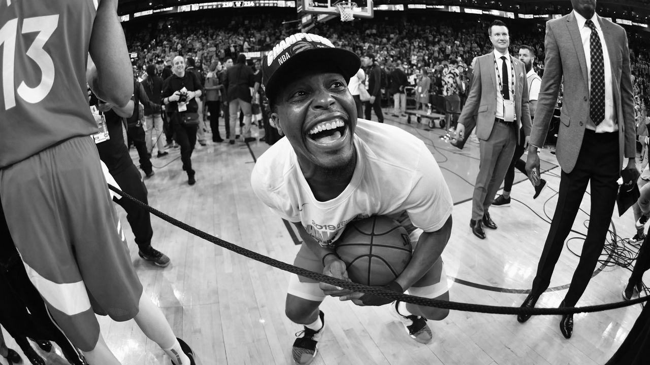 OAKLAND, CA - JUNE 13: Kyle Lowry #7 of the Toronto Raptors celebrates after winning the 2019 NBA Championship against the Golden State Warriors during Game Six of the NBA Finals on June 13, 2019 at ORACLE Arena in Oakland, California. NOTE TO USER: User expressly acknowledges and agrees that, by downloading and/or using this photograph, user is consenting to the terms and conditions of Getty Images License Agreement. Mandatory Copyright Notice: Copyright 2019 NBAE (EDITORS NOTE this image has been converted to black and white)