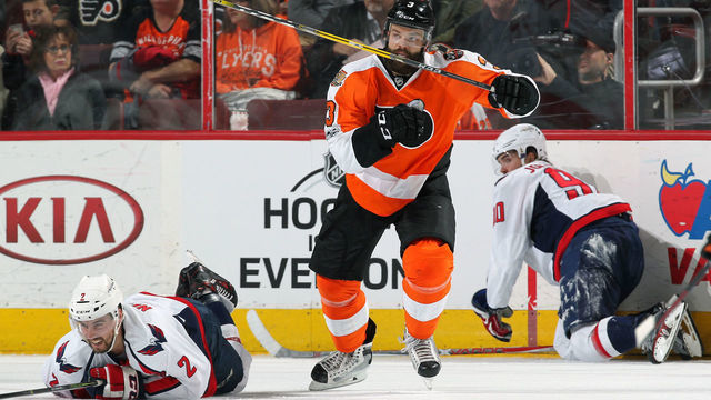 PHILADELPHIA, PA - FEBRUARY 22: Radko Gudas #3 of the Philadelphia Flyers battles against Matt Niskanen #2 and Marcus Johansson #90 of the Washington Capitals on February 22, 2017 at the Wells Fargo Center in Philadelphia, Pennsylvania.