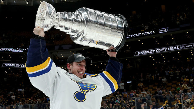BOSTON, MASSACHUSETTS - JUNE 12: Jordan Binnington #50 of the St. Louis Blues hoists the Stanley Cup on the ice after the 2019 NHL Stanley Cup Final at TD Garden on June 12, 2019 in Boston, Massachusetts. The St. Louis Blues defeated the Boston Bruins 4-1 in Game 7 to win the Stanley Cup Final 4-3.