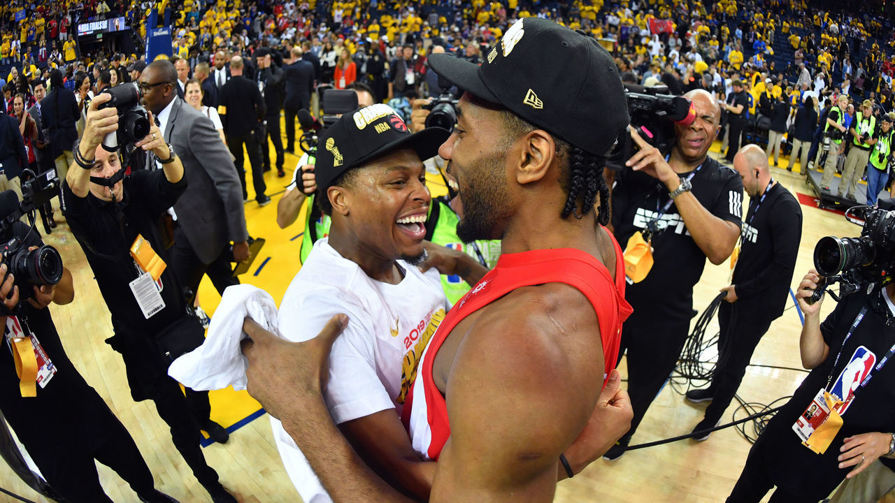 OAKLAND, CA - JUNE 13: Kyle Lowry #7 of the Toronto Raptors and Kawhi Leonard #2 of the Toronto Raptors celebrate after winning the 2019 NBA Championship against the Golden State Warriors during Game Six of the NBA Finals on June 13, 2019 at ORACLE Arena in Oakland, California. NOTE TO USER: User expressly acknowledges and agrees that, by downloading and/or using this photograph, user is consenting to the terms and conditions of Getty Images License Agreement. Mandatory Copyright Notice: Copyright 2019 NBAE