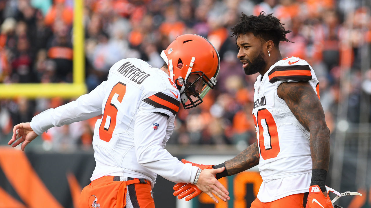 CINCINNATI, OH - NOVEMBER 25, 2018: wide receiver Jarvis Landry #80 of the Cleveland Browns greets quarterback Baker Mayfield #6 on the sideline after a rushing touchdown by running back Nick Chubb in the first quarter of a game against the Cincinnati Bengals on November 25, 2018 at Paul Brown Stadium in Cincinnati, Ohio. Cleveland won 35-20. (Photo by: 2018 Nick Cammett/Diamond Images/Getty Images)