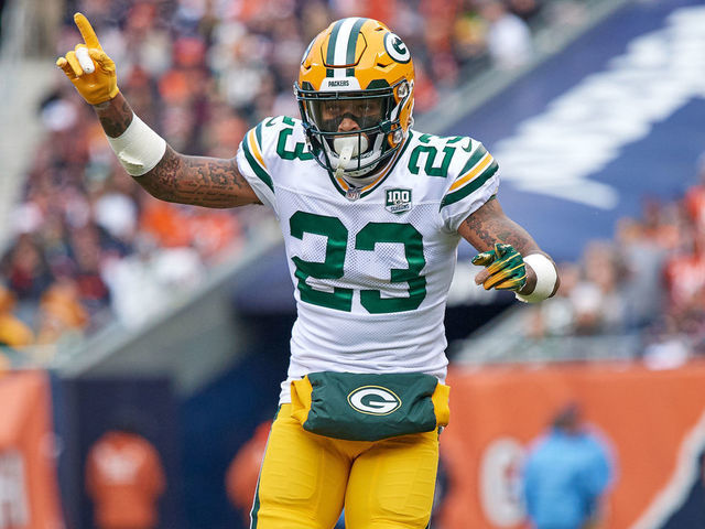 CHICAGO, IL - DECEMBER 16: Green Bay Packers cornerback Jaire Alexander (23) signals a play in action during an NFL game between the Green Bay Packers and the Chicago Bears on December 16, 2018 at Soldier Field in Chicago, IL.