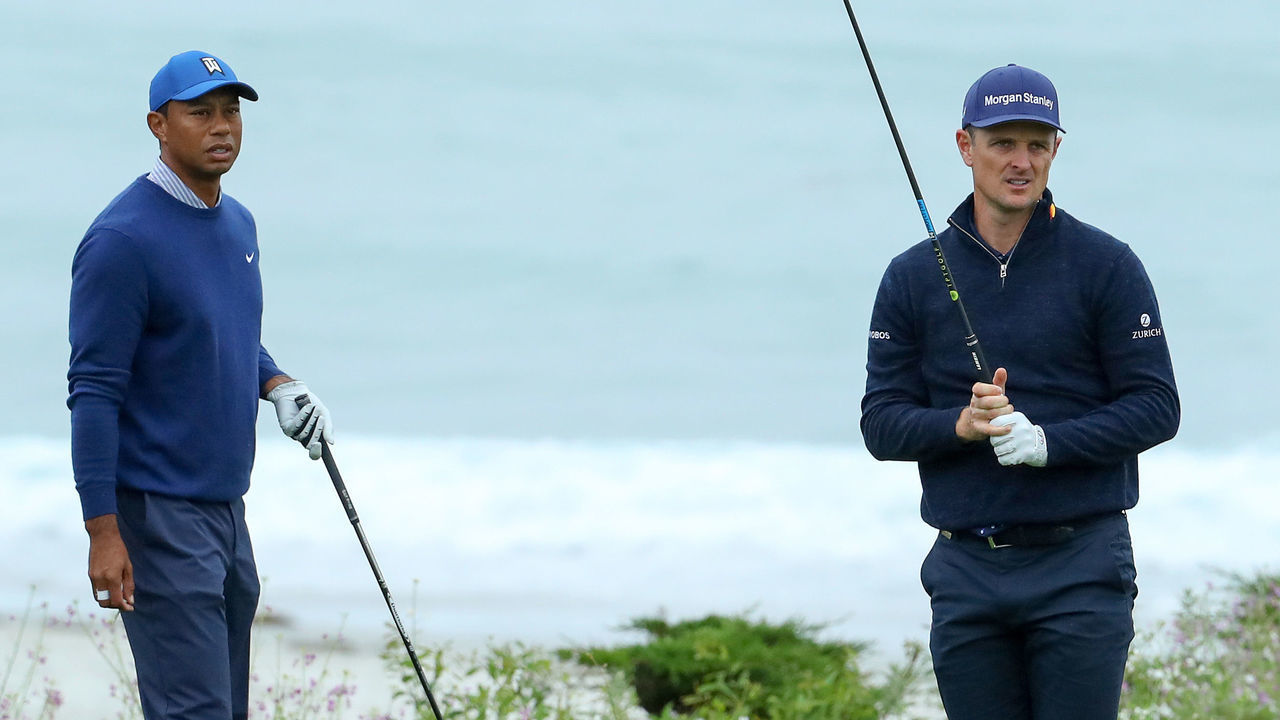 PEBBLE BEACH, CALIFORNIA - JUNE 14: Tiger Woods of the United States (L) and Justin Rose of England watch a ball on the 11th tee during the second round of the 2019 U.S. Open at Pebble Beach Golf Links on June 14, 2019 in Pebble Beach, California.