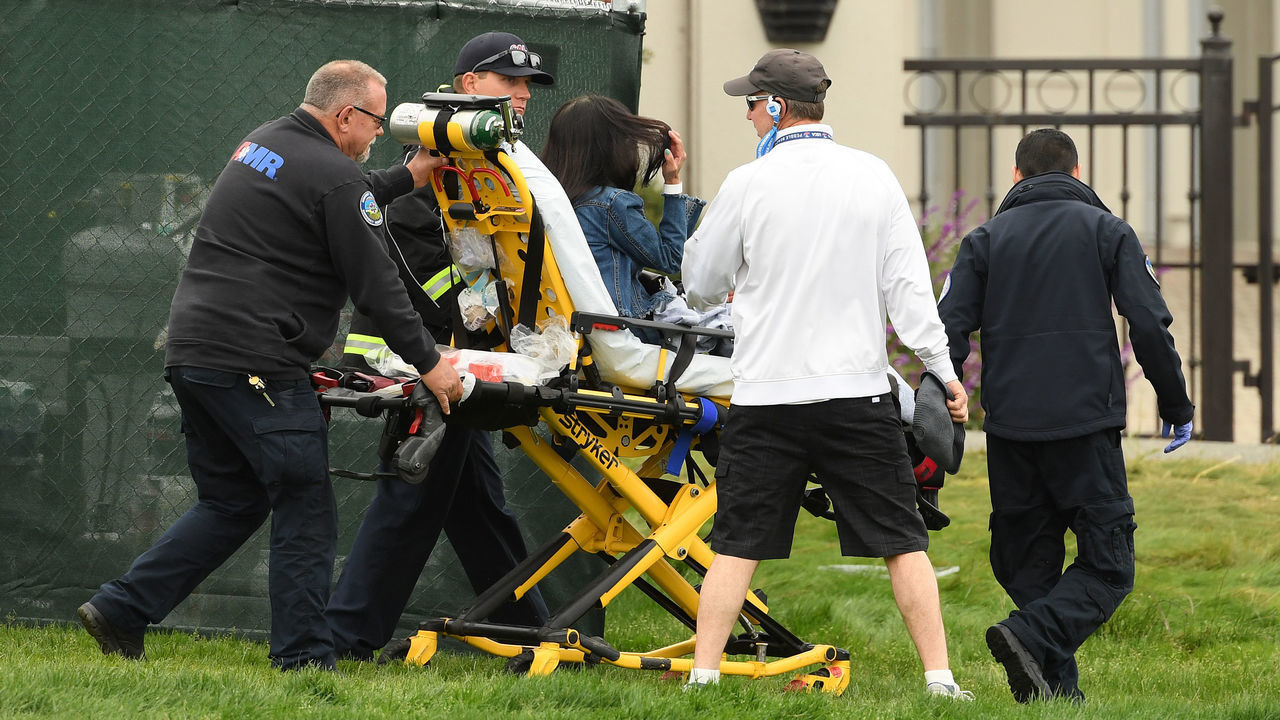 PEBBLE BEACH, CALIFORNIA - JUNE 14: Medical attention is administered after an incident involving a golf cart on the 16th hole during the second round of the 2019 U.S. Open at Pebble Beach Golf Links on June 14, 2019 in Pebble Beach, California.