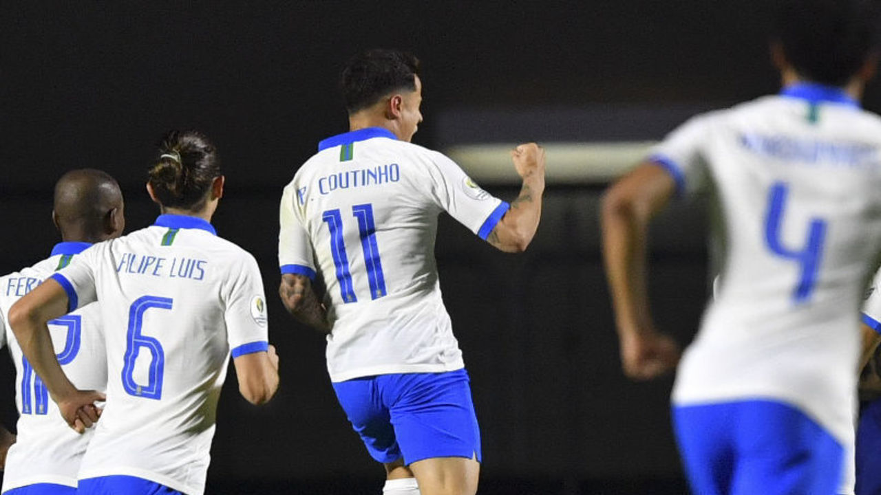 Brazil's Philippe Coutinho (C) celebrates after scoring against Bolivia during their Copa America football tournament group match at the Cicero Pompeu de Toledo Stadium, also known as Morumbi, in Sao Paulo, Brazil, on June 14, 2019.