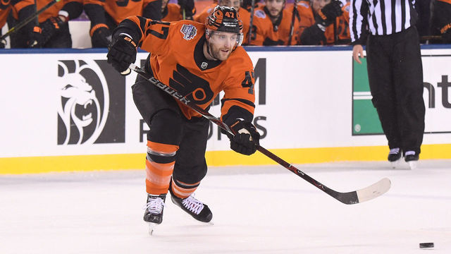 PHILADELPHIA, PA - FEBRUARY 23: Andrew MacDonald #47 of the Philadelphia Flyers passes the puck during the 2019 Coors Light NHL Stadium Series game between the Pittsburgh Penguins and the Philadelphia Flyers at Lincoln Financial Field on February 23, 2019 in Philadelphia, Pennsylvania.