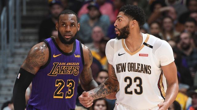 LOS ANGELES, CA - DECEMBER 21: LeBron James #23 of the Los Angeles Lakers and Anthony Davis #23 of the New Orleans Pelicans fight for position during a game on December 21, 2018 at STAPLES Center in Los Angeles, California. NOTE TO USER: User expressly acknowledges and agrees that, by downloading and/or using this Photograph, user is consenting to the terms and conditions of the Getty Images License Agreement. Mandatory Copyright Notice: Copyright 2018 NBAE